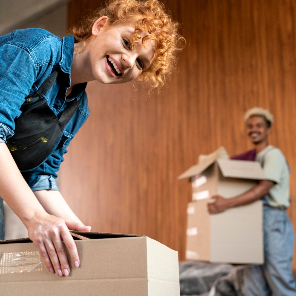 Couple with cardboard boxes